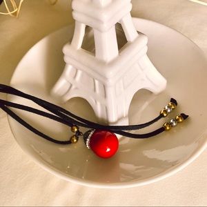 Bohemian suede wrap black choker | red stone